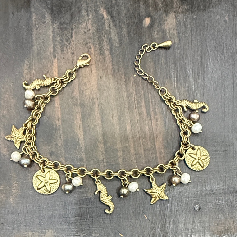 Gold Charm Bracelet with Starfish and Seahorse Accents